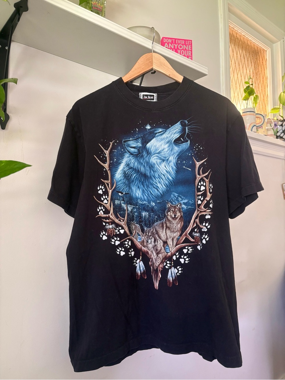 The Mountain Black Tee with Blue Howling Wolf & Wolf Pack Graphic